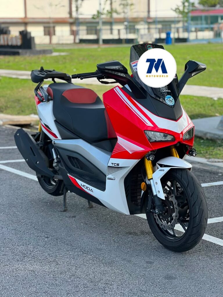 Front-3/4 view of the red and white motorcycle