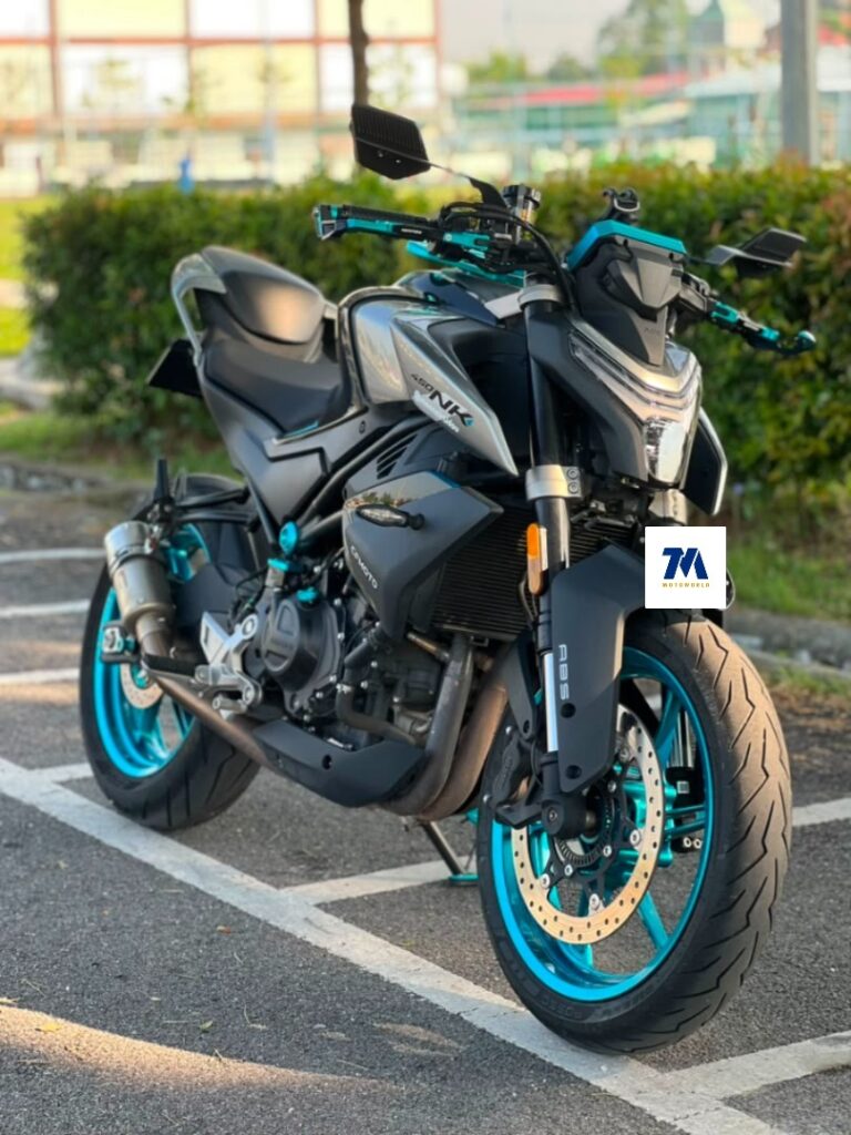 Front-3/4 view of a motorcycle with blue accents
