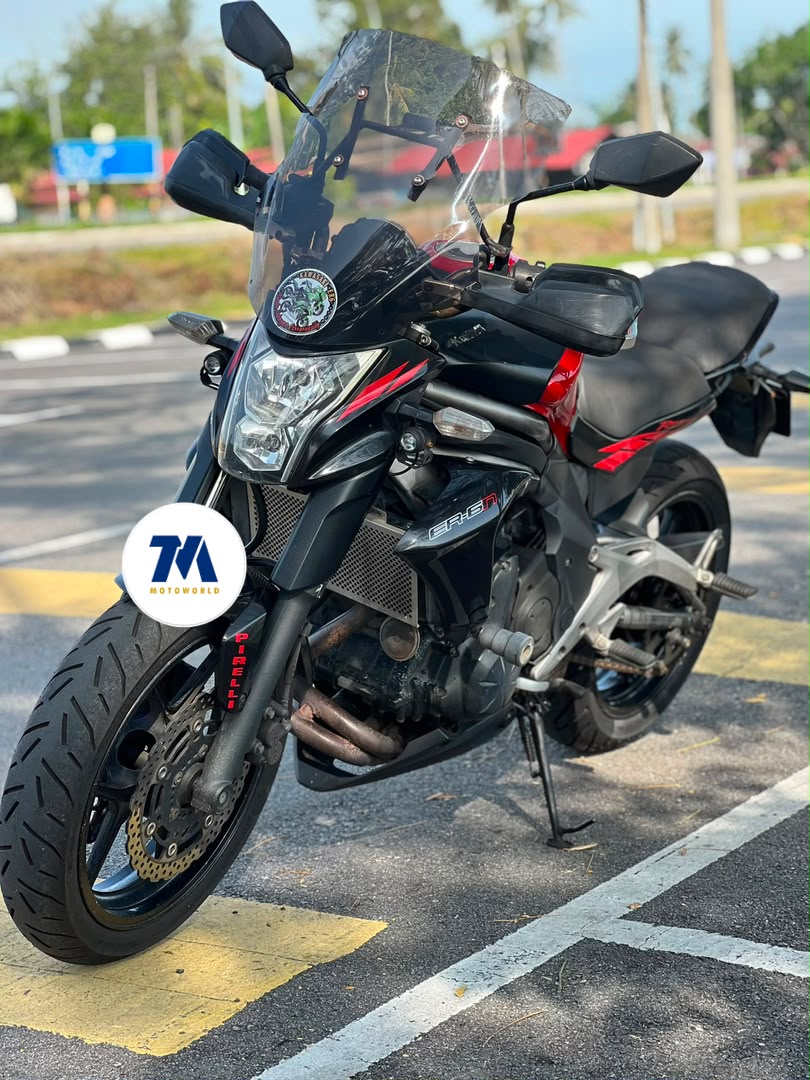 Front view of the used motorcycle with headlight and handlebars visible