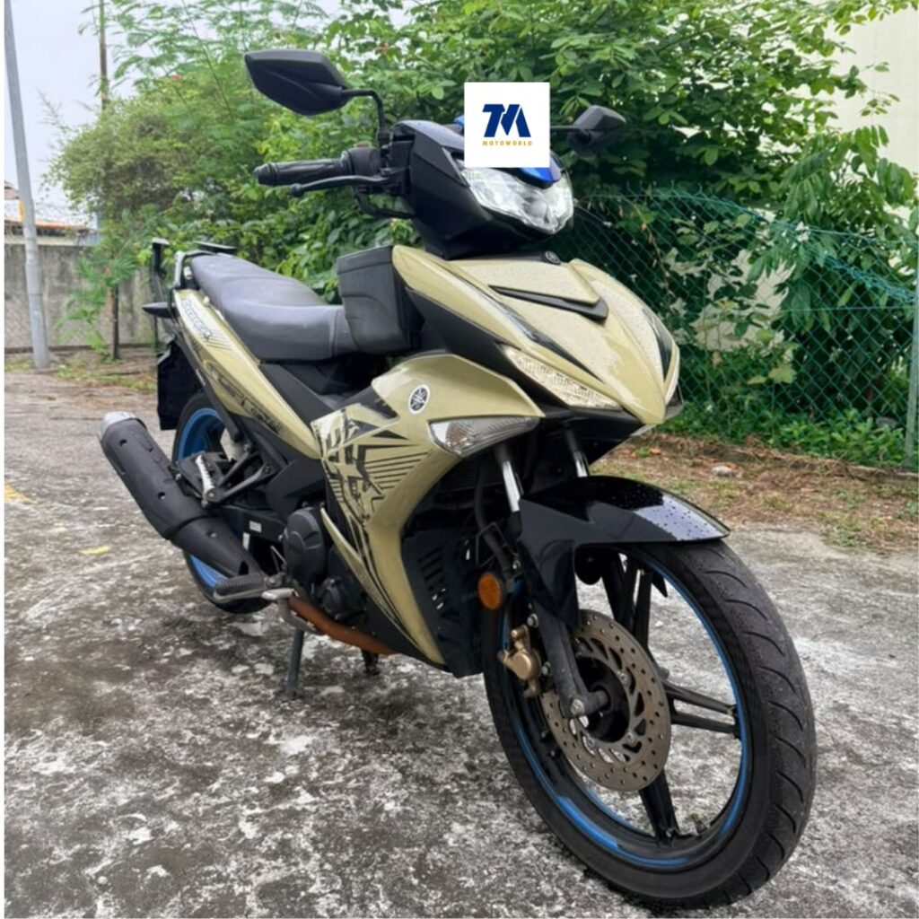 Front 3/4 view of gold motorcycle