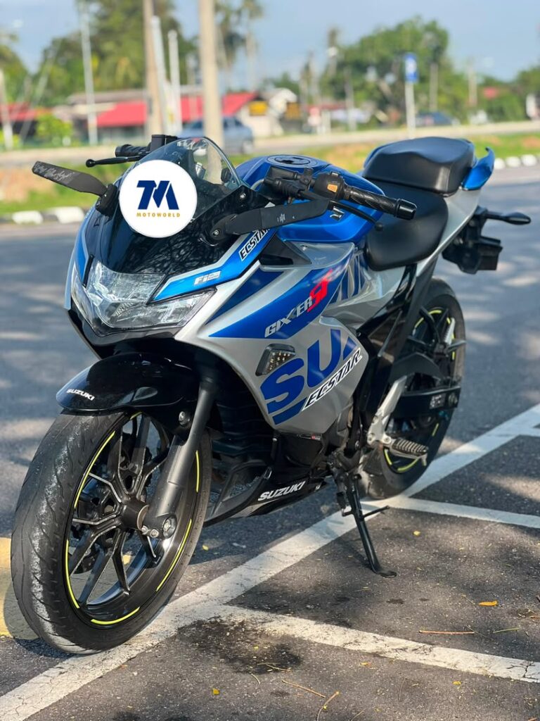 Front view of a Suzuki Gixxer SF GP motorcycle, showcasing the headlight and handlebars.