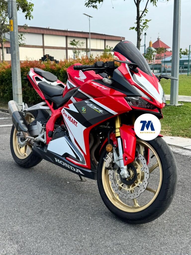 Front view of red and white Honda CBR250RR motorcycle