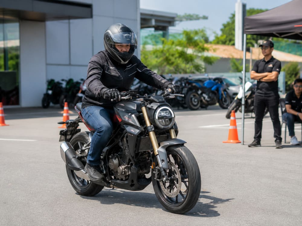 Rider testing a 250cc motorcycle during a TM Motoworld test ride event