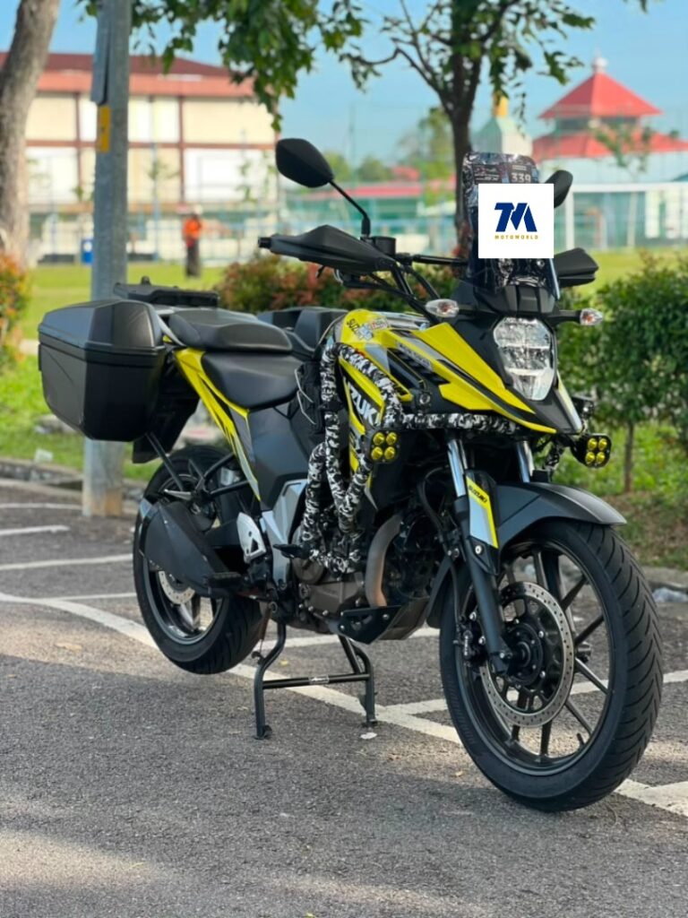 Front view of the Suzuki V-Strom SX in yellow with a headlight and front fairing visible