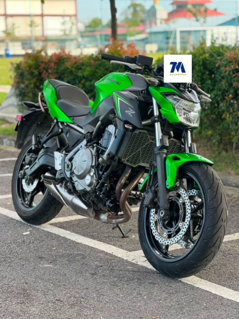 Kawasaki Z650 in green, front 3/4 view