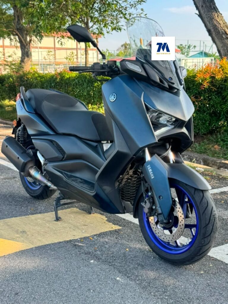 Front view of a blue YAMAHA XMAX V2 motorcycle.