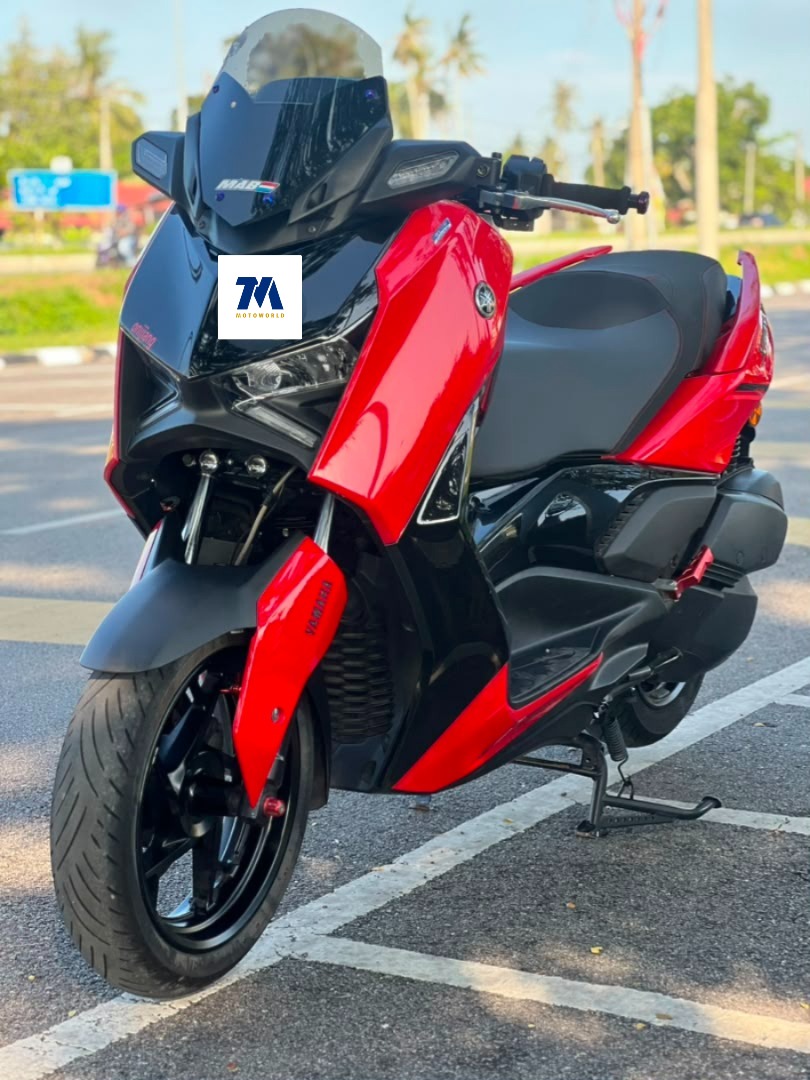 front view of a red Yamaha XMAX V2 motorcycle