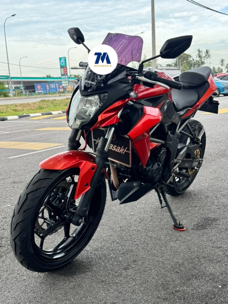 Front view of a red Kawasaki Z25SL motorcycle facing the camera.