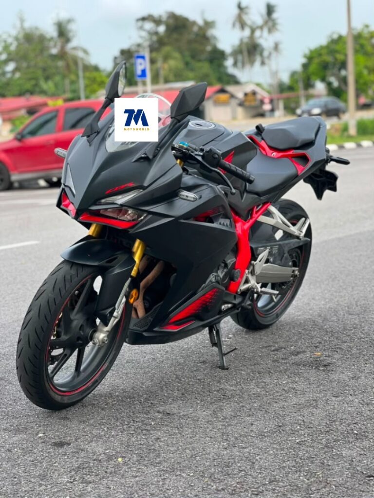 Front view of the Honda CBR250RR motorcycle, black with red accents