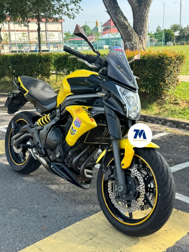 Front view of a yellow Kawasaki ER6N motorcycle