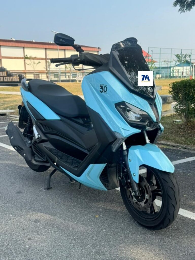 front view of a Modenas Elit 150 in baby blue