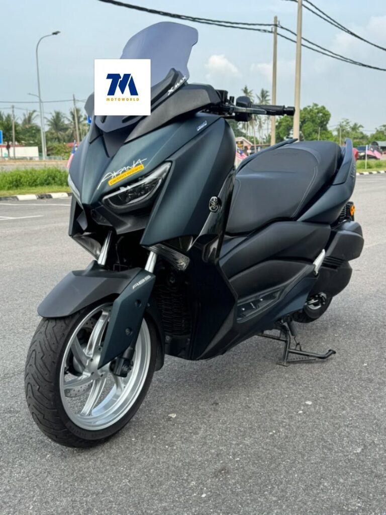 front view of dark green Yamaha XMAX V1 motorcycle