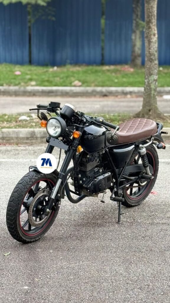 front 3/4 view of a black cafe racer motorcycle