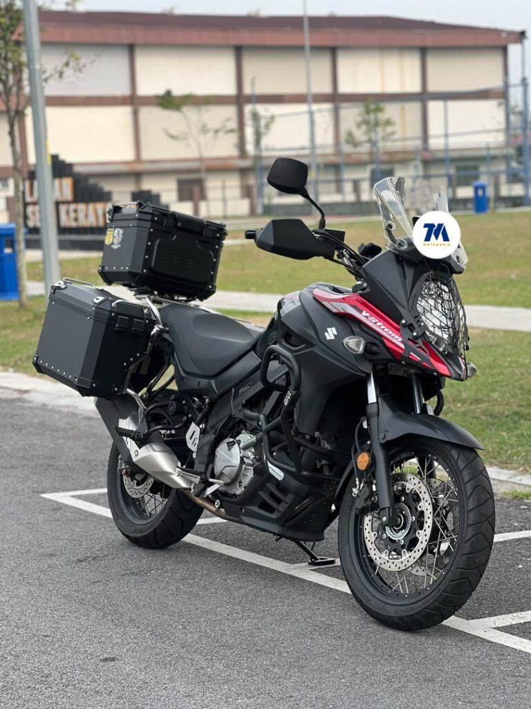 Front view of a Suzuki Vstrom 650 motorcycle with three boxes