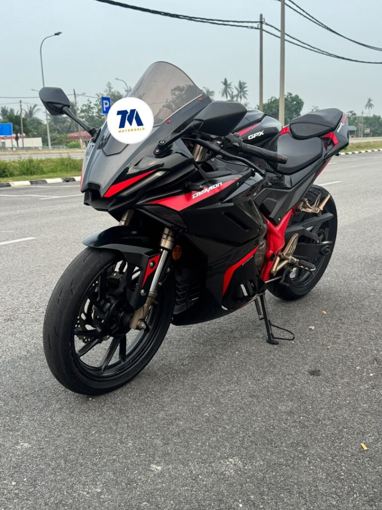 front view of black and red sports bike