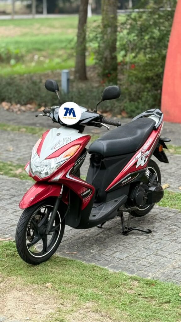 front-3/4 view of red Yamaha Nouvo LC motorcycle