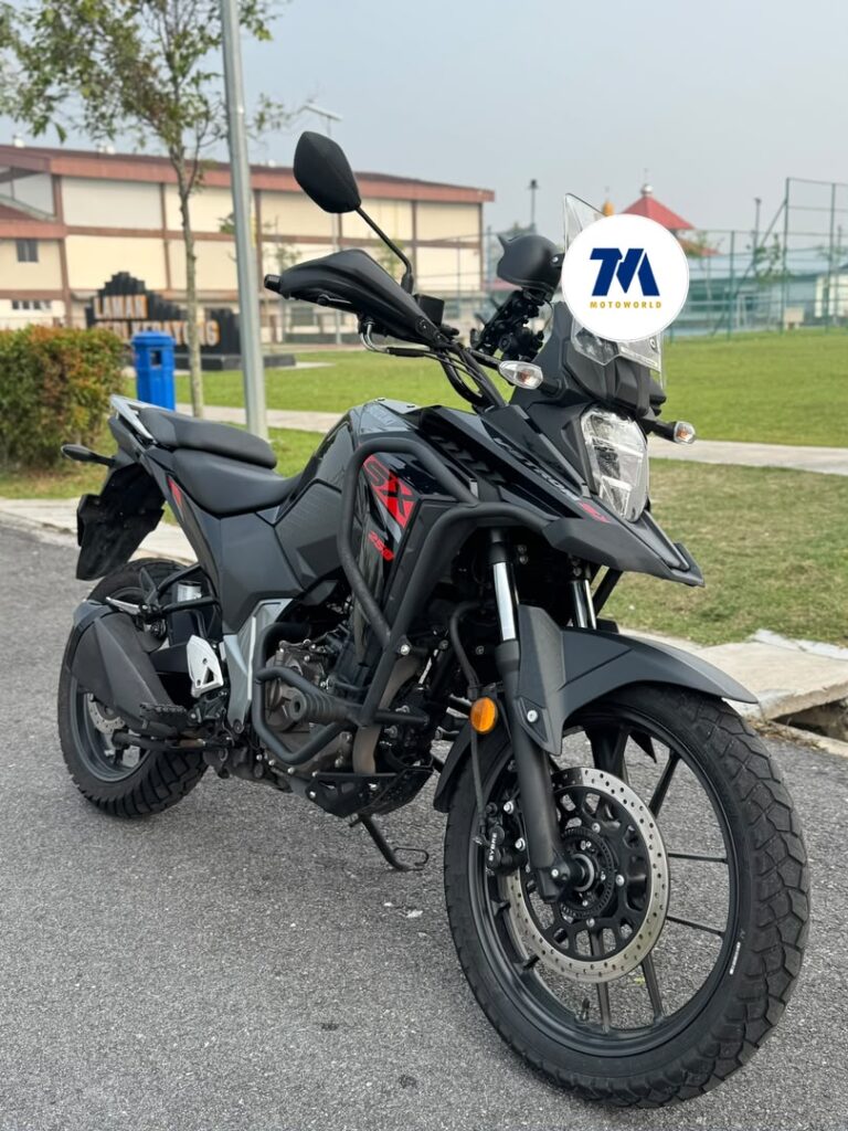 Front view of Suzuki V-Strom SX 250 motorcycle, showing its headlight and front fairing.