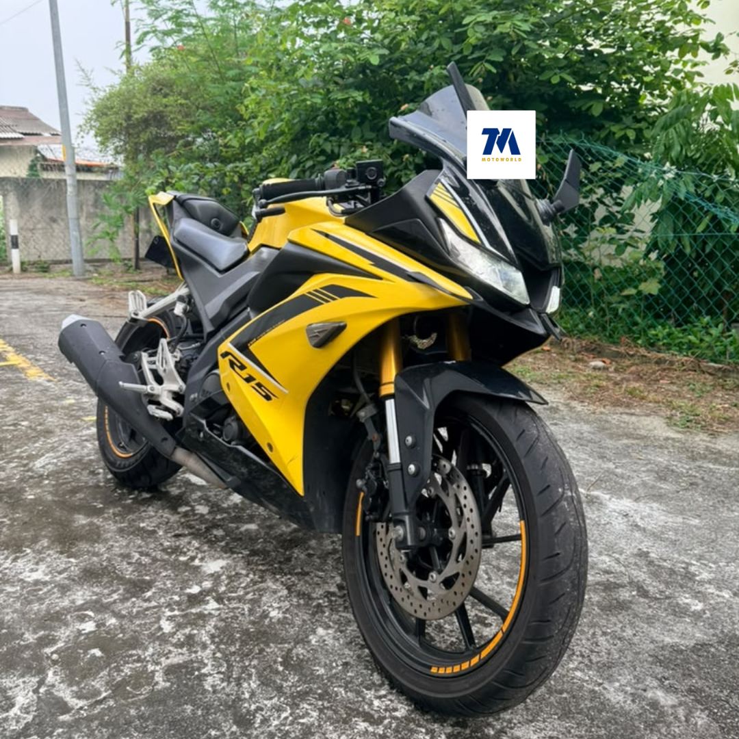 Front 3/4 view of yellow Yamaha R15 motorcycle