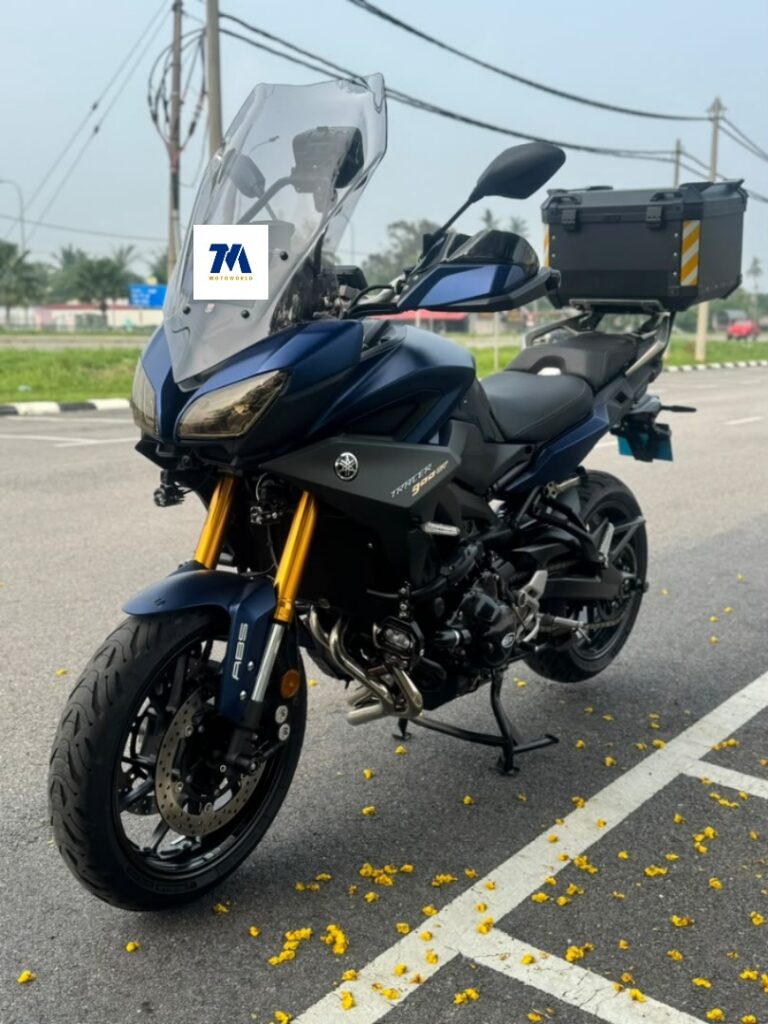 front view of Yamaha Tracer motorcycle with windshield and panniers
