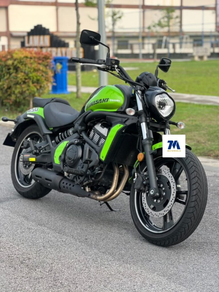 front view of green Kawasaki Vulcan S motorcycle