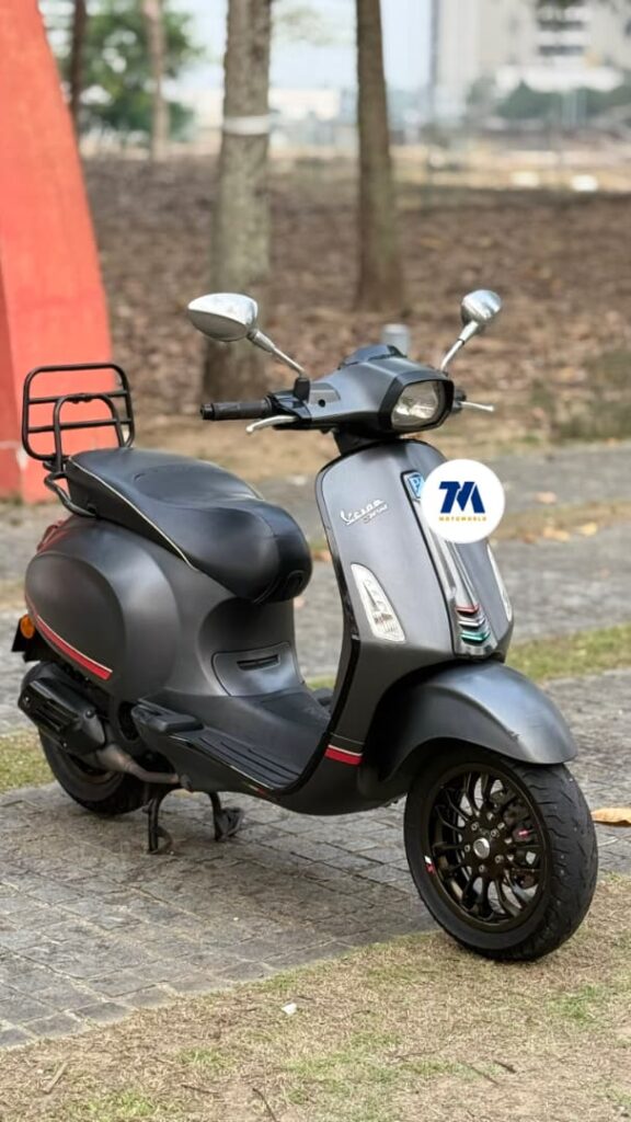 front-3/4 view of a Vespa Sprint 150 in matte gray