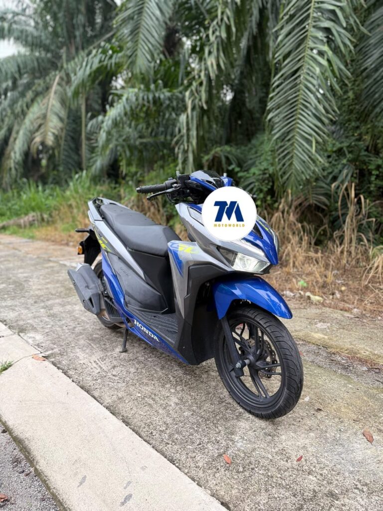 front view of blue and black Honda Vario 150 motorcycle facing camera