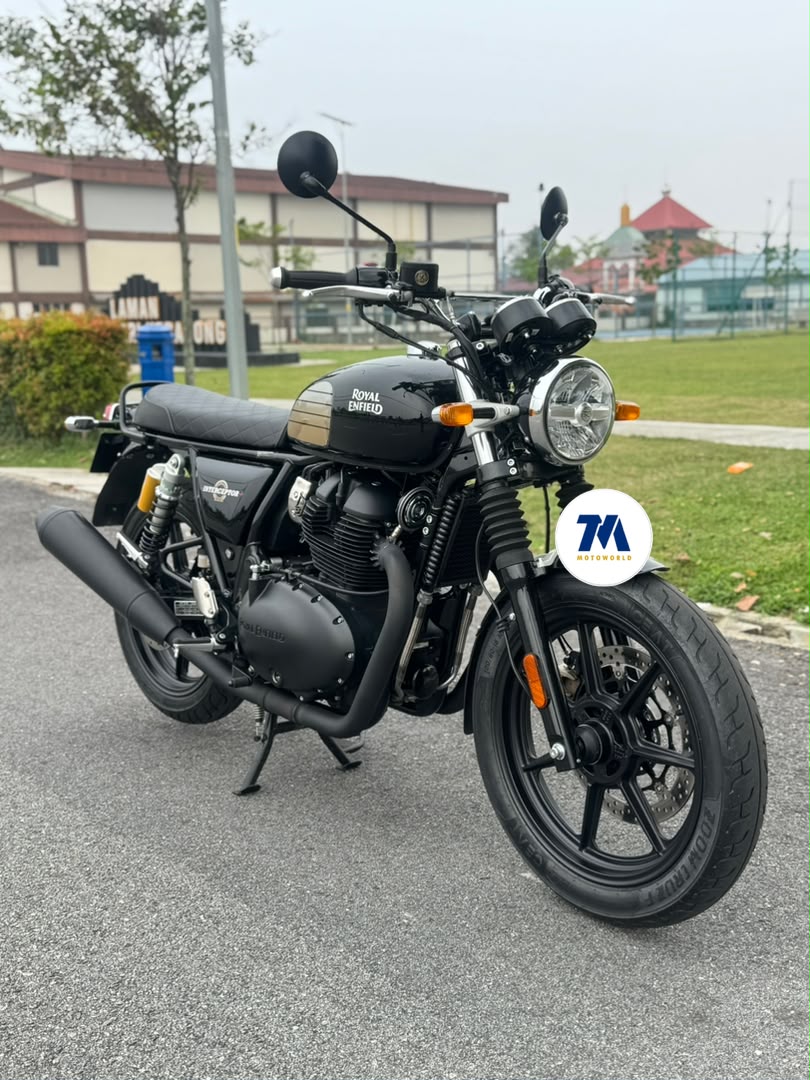 Royal Enfield Interceptor 650 facing front-left in a parking lot