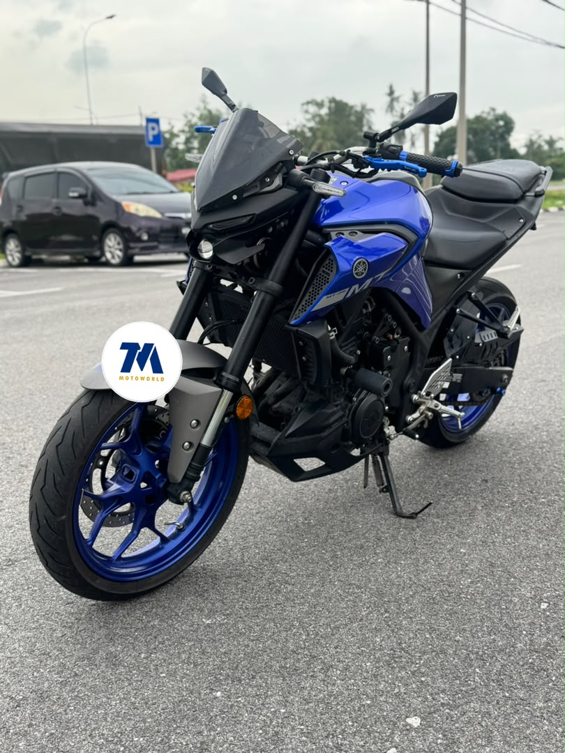 front view of a blue Yamaha MT25 motorcycle