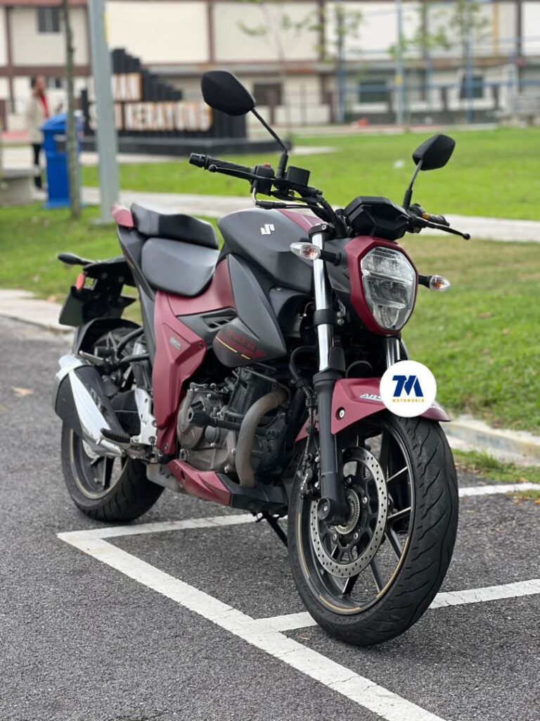 Front view of a maroon Suzuki Gixxer 250 Naked motorcycle